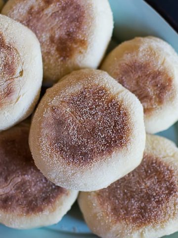 homemade sourdough English Muffins on tray