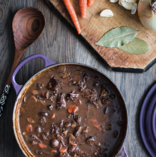Dutch oven filled with rich boeuf bourguignon