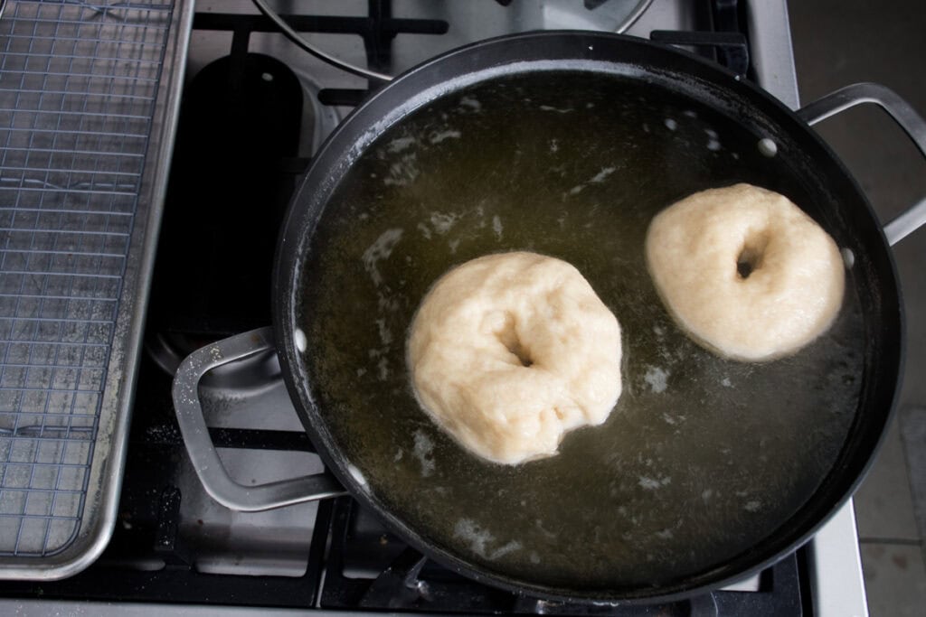 visual of how to boil sourdough bagels
