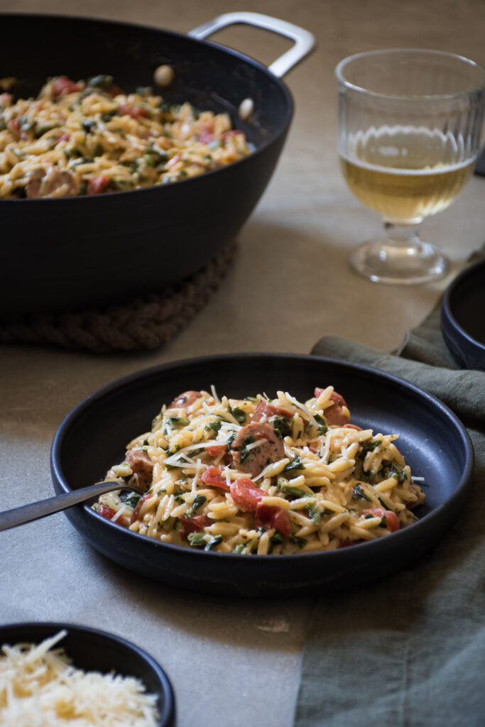 One-pot orzo recipe with Italian sausage, Spinach, and Tomatoes
